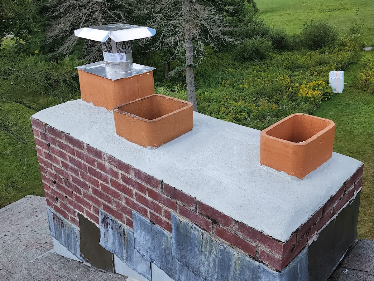 Mountain chimney and stone Chimney Sweep in Surry, NH photo