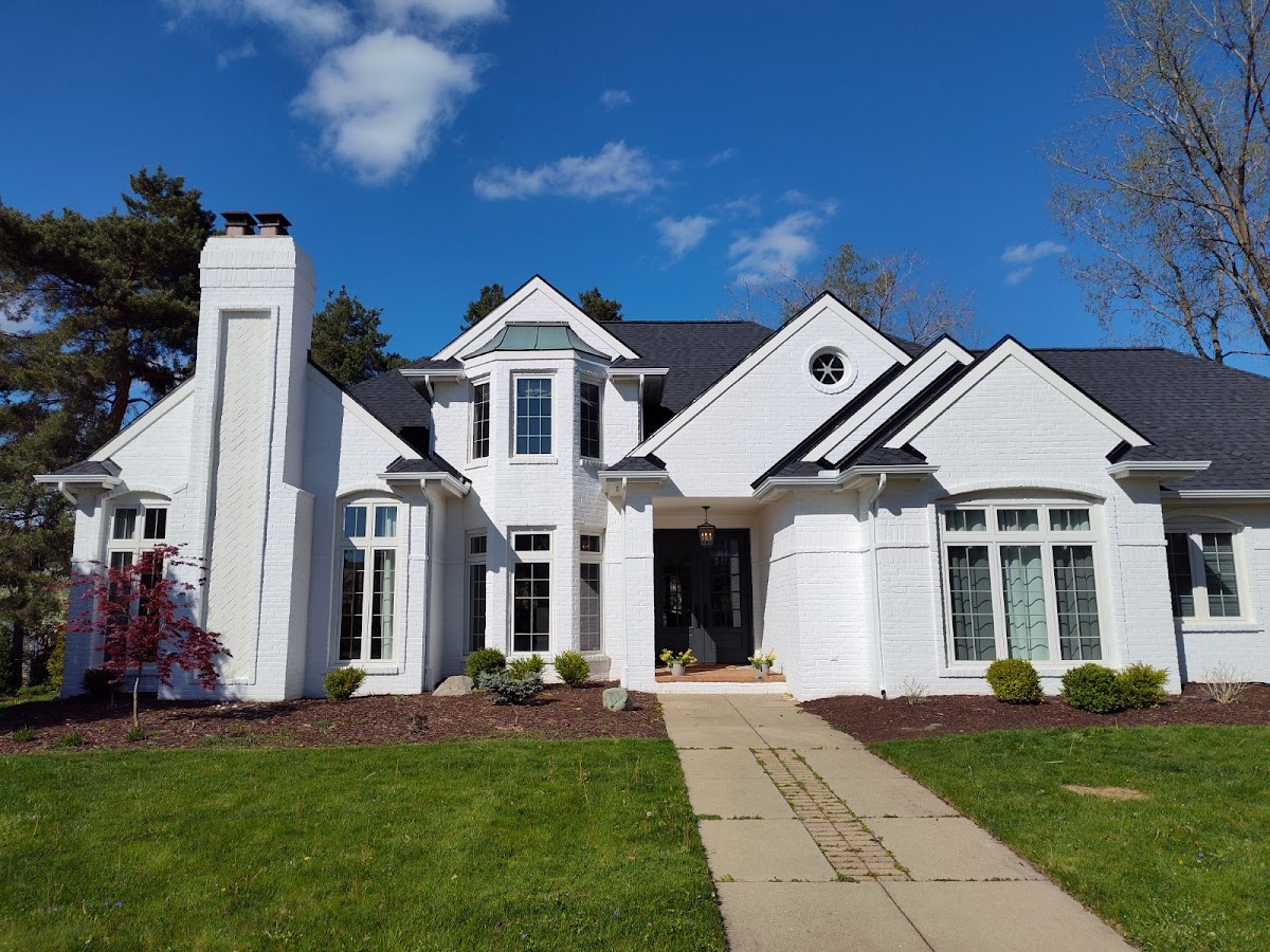 Evergreen Painting & Construction Roofing Repair in Lansing, MI photo